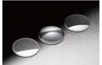 Monolithic focusing lens